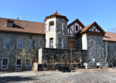 Engel Lukas Hall, Original St. Luke's Hospital, stonework, turrets, gables